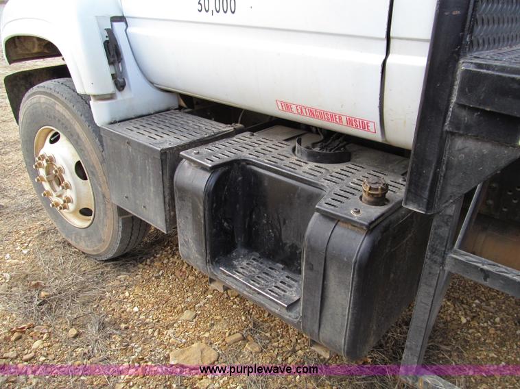 image for item D3071 1999 GMC C7500 dump truck