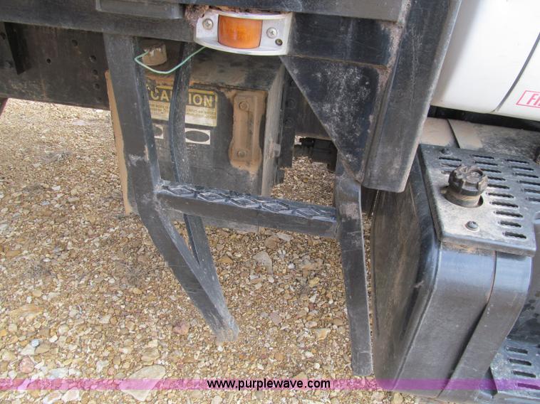 image for item D3071 1999 GMC C7500 dump truck