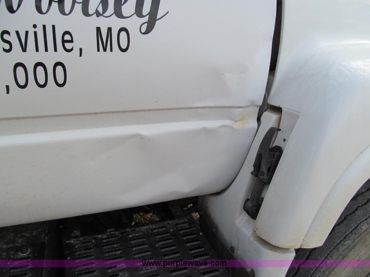 image for item D3071 1999 GMC C7500 dump truck