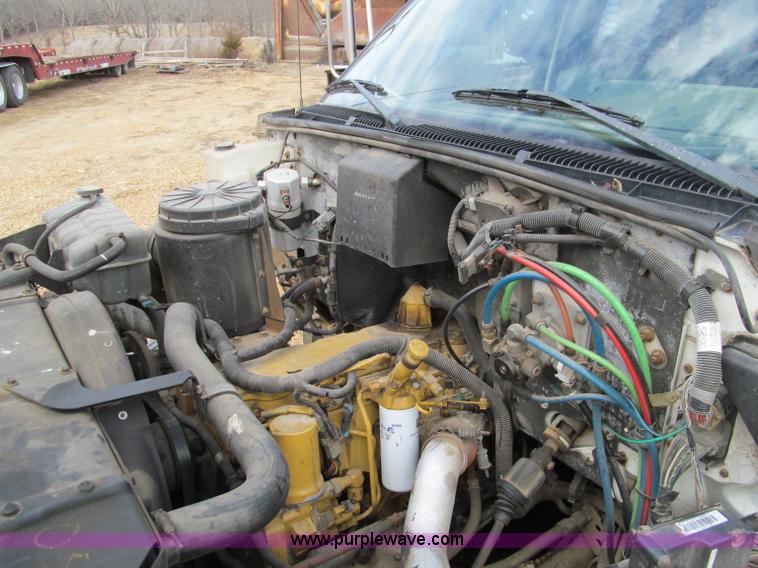 image for item D3071 1999 GMC C7500 dump truck