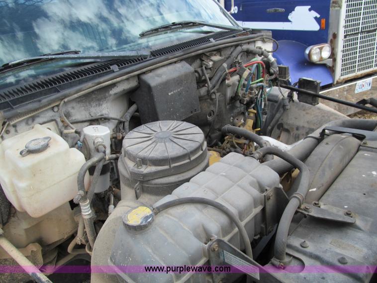 image for item D3071 1999 GMC C7500 dump truck