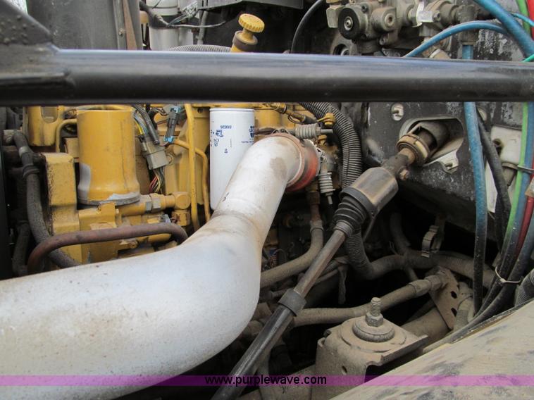 image for item D3071 1999 GMC C7500 dump truck