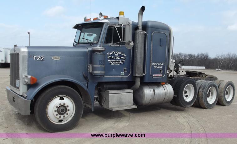 image for item D3693 1989 Peterbilt 379 triple axle semi truck