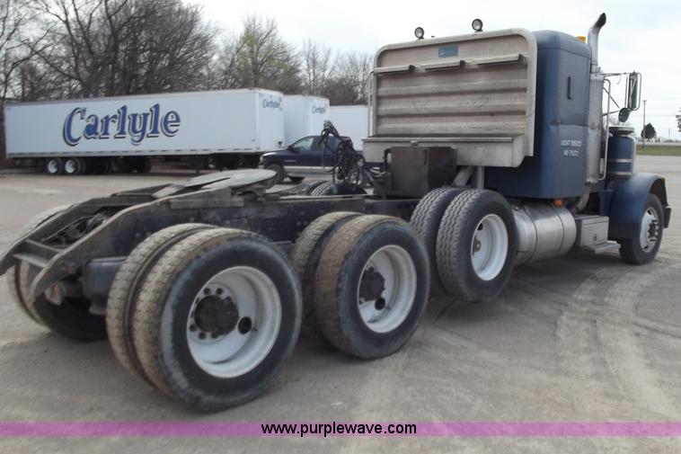 image for item D3693 1989 Peterbilt 379 triple axle semi truck