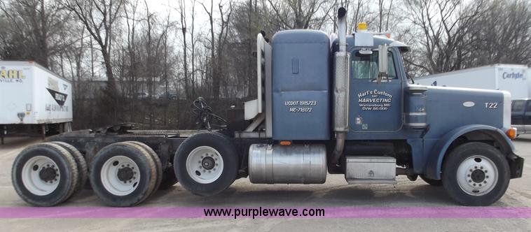 image for item D3693 1989 Peterbilt 379 triple axle semi truck