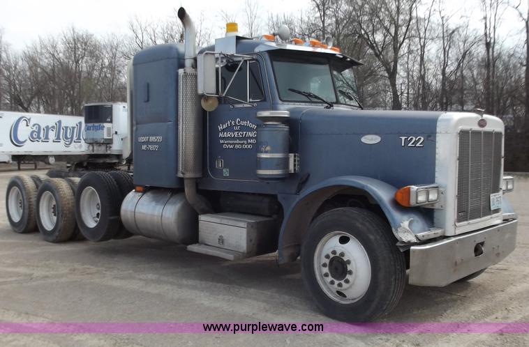 image for item D3693 1989 Peterbilt 379 triple axle semi truck