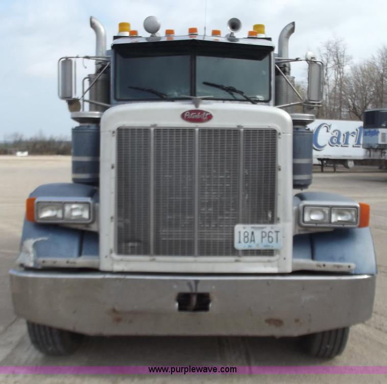 image for item D3693 1989 Peterbilt 379 triple axle semi truck