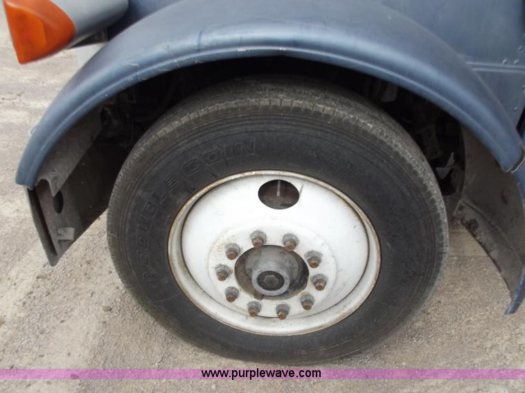 image for item D3693 1989 Peterbilt 379 triple axle semi truck