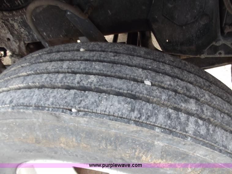 image for item D3693 1989 Peterbilt 379 triple axle semi truck