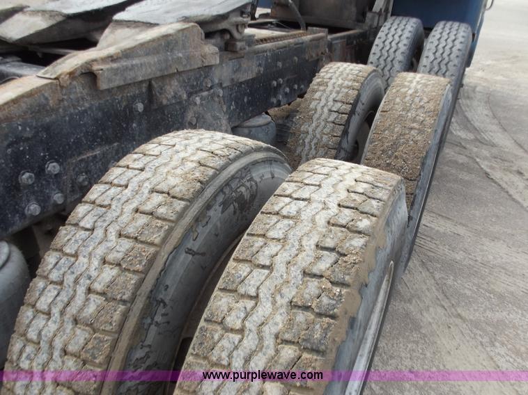 image for item D3693 1989 Peterbilt 379 triple axle semi truck