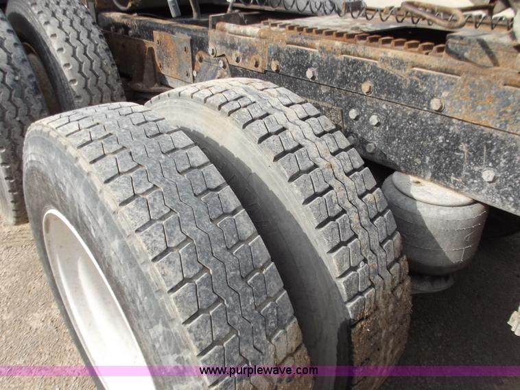 image for item D3693 1989 Peterbilt 379 triple axle semi truck