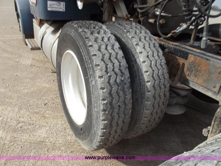 image for item D3693 1989 Peterbilt 379 triple axle semi truck