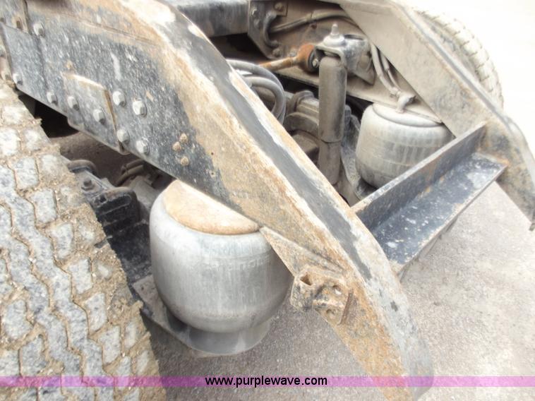 image for item D3693 1989 Peterbilt 379 triple axle semi truck