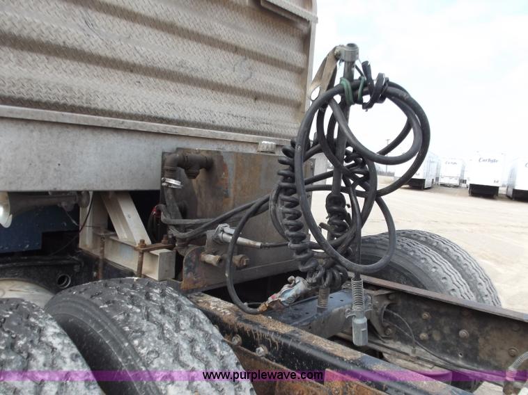 image for item D3693 1989 Peterbilt 379 triple axle semi truck