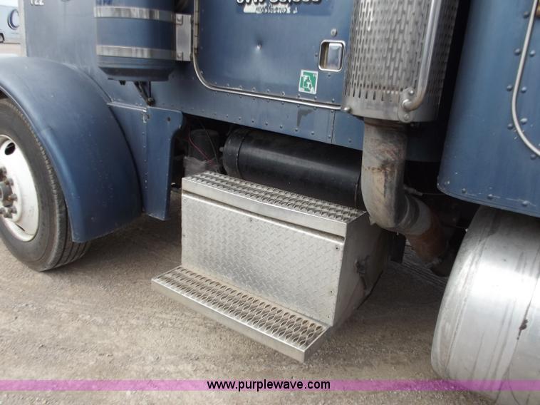 image for item D3693 1989 Peterbilt 379 triple axle semi truck