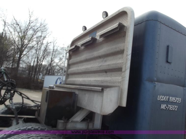 image for item D3693 1989 Peterbilt 379 triple axle semi truck