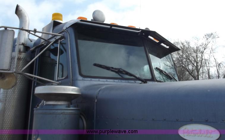 image for item D3693 1989 Peterbilt 379 triple axle semi truck