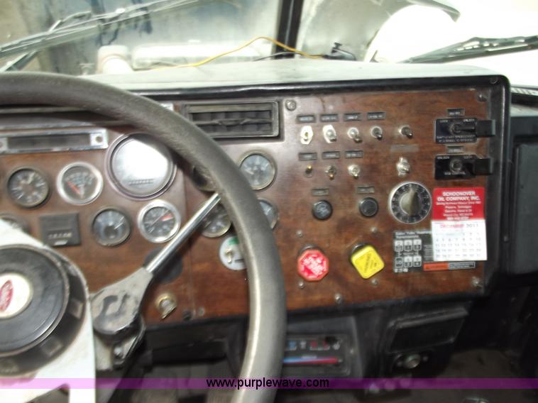 image for item D3693 1989 Peterbilt 379 triple axle semi truck