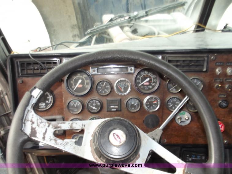 image for item D3693 1989 Peterbilt 379 triple axle semi truck