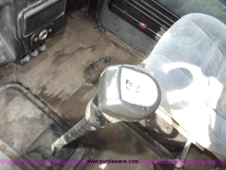 image for item D3693 1989 Peterbilt 379 triple axle semi truck