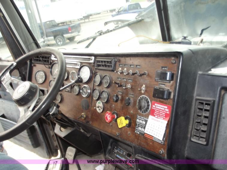 image for item D3693 1989 Peterbilt 379 triple axle semi truck