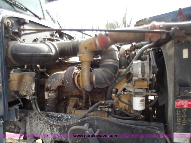 image for item D3693 1989 Peterbilt 379 triple axle semi truck