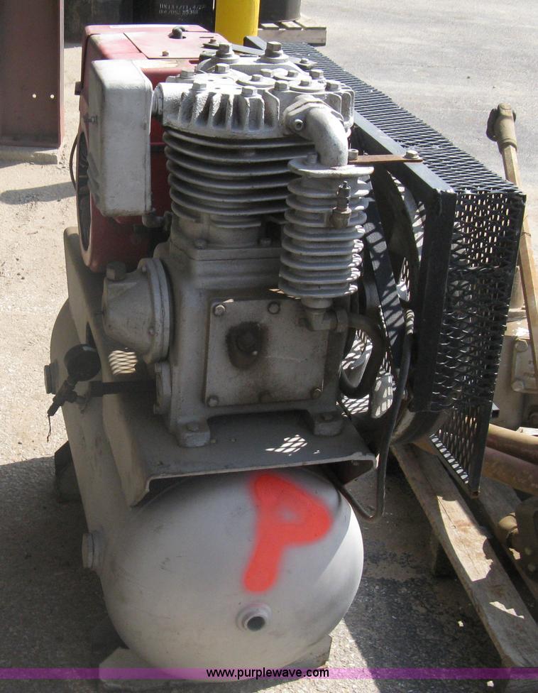 Gas powered air compressor in Wichita, KS Item G9762 sold Purple Wave