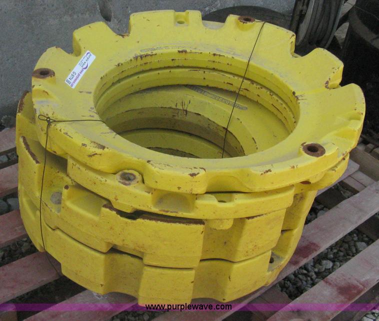 image for item G9774 (4) John Deere wheel weights