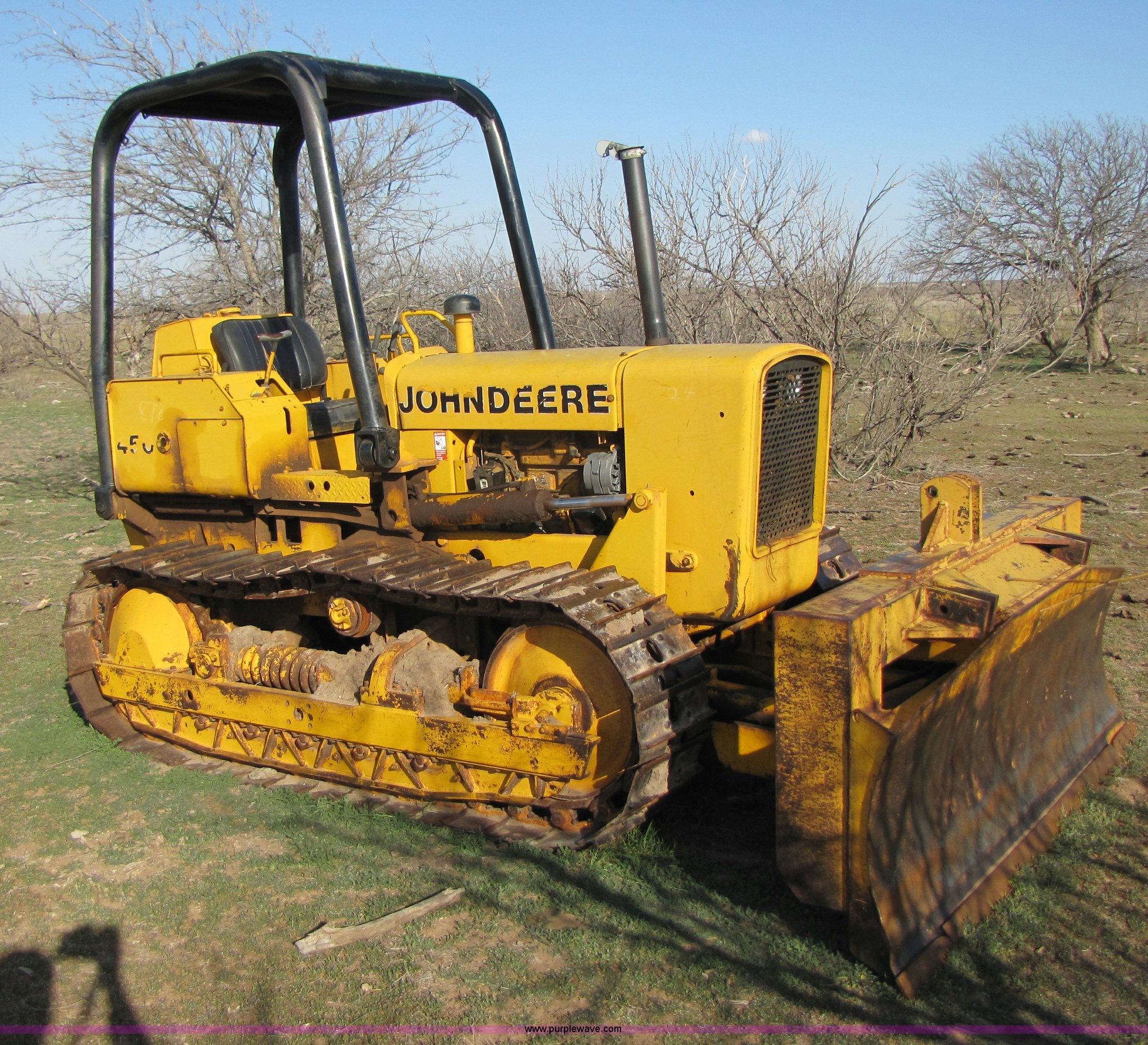 John Deere 450C dozer in Dickens, TX Item B2257 sold Purple Wave