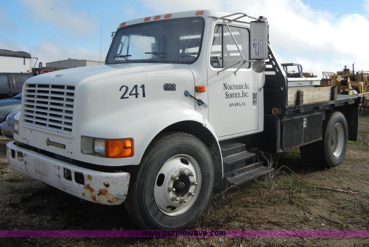 image for item C4366 1997 International 4700 flatbed truck