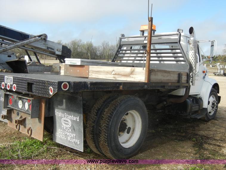 image for item C4366 1997 International 4700 flatbed truck