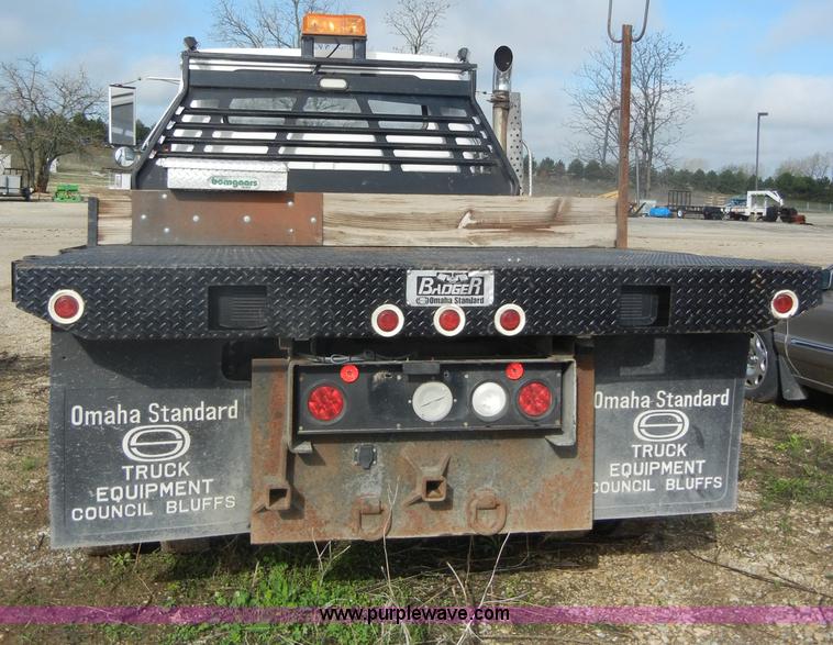 image for item C4366 1997 International 4700 flatbed truck