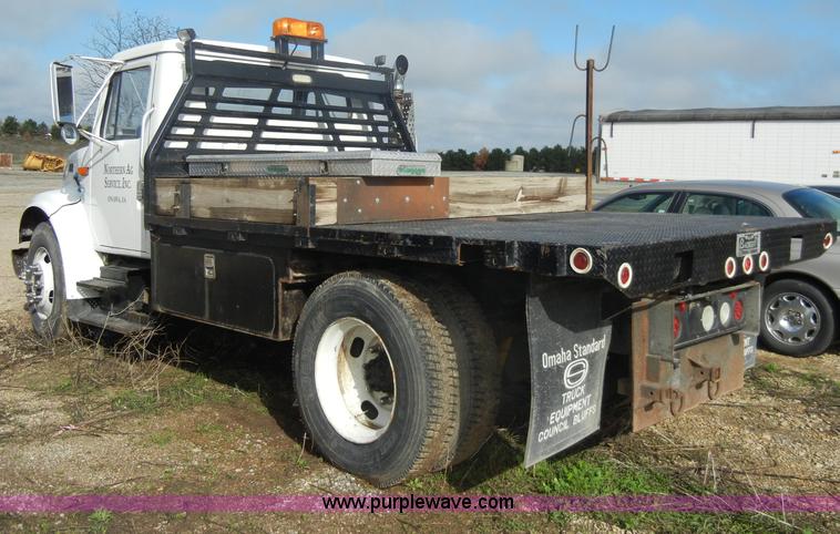 image for item C4366 1997 International 4700 flatbed truck