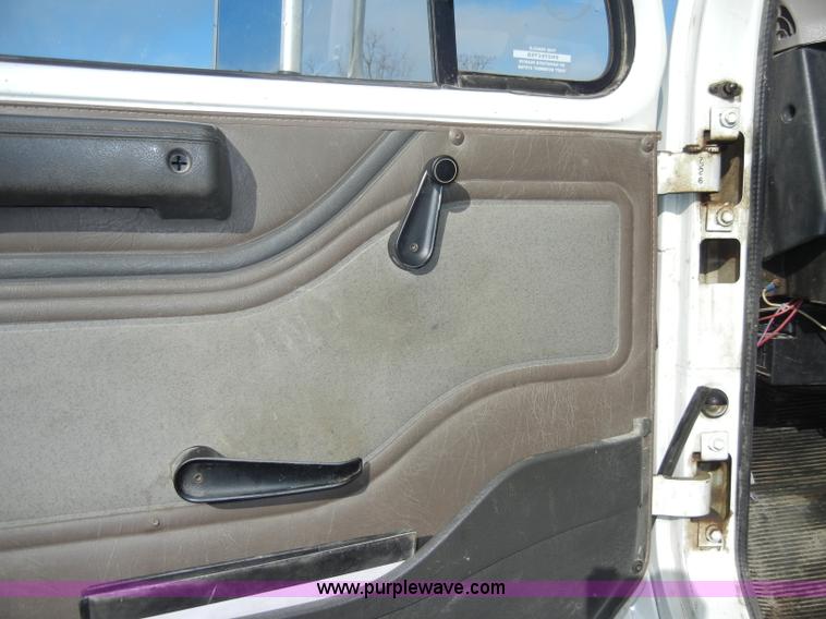 image for item C4366 1997 International 4700 flatbed truck