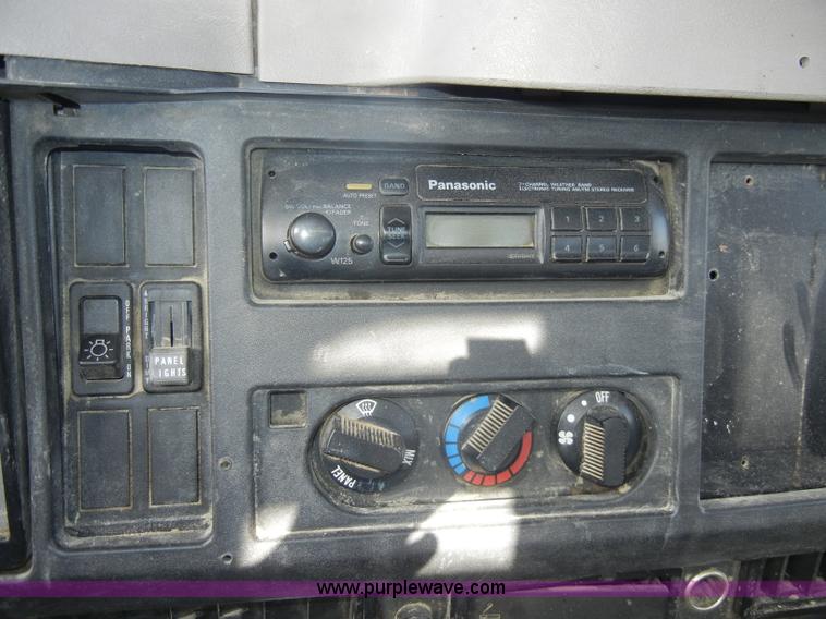 image for item C4366 1997 International 4700 flatbed truck