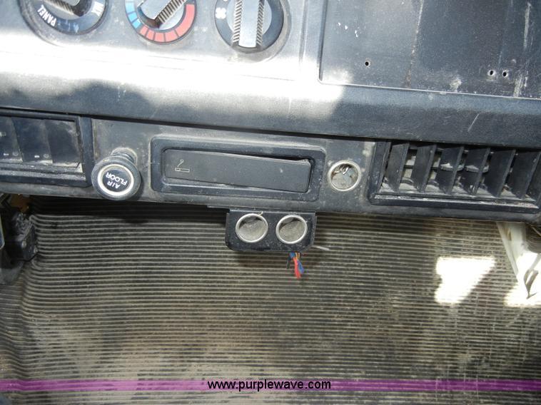 image for item C4366 1997 International 4700 flatbed truck