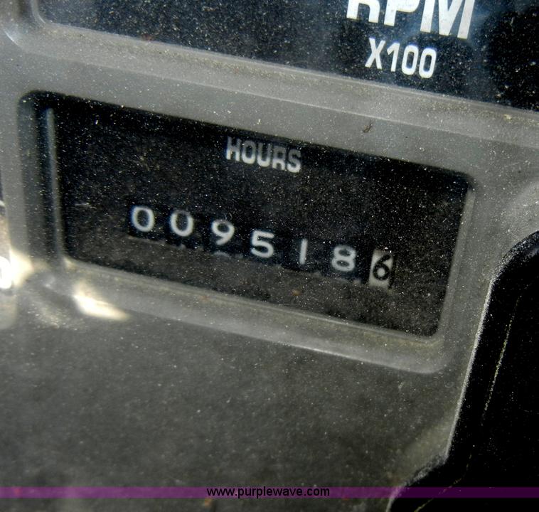 image for item C4366 1997 International 4700 flatbed truck