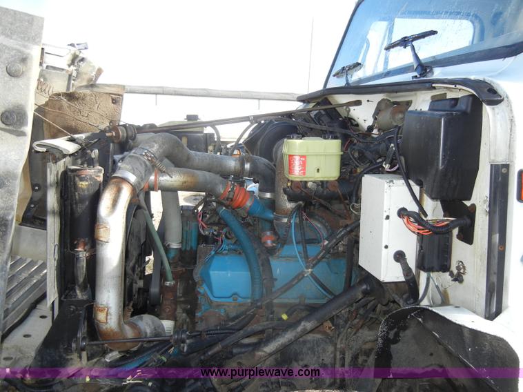 image for item C4366 1997 International 4700 flatbed truck