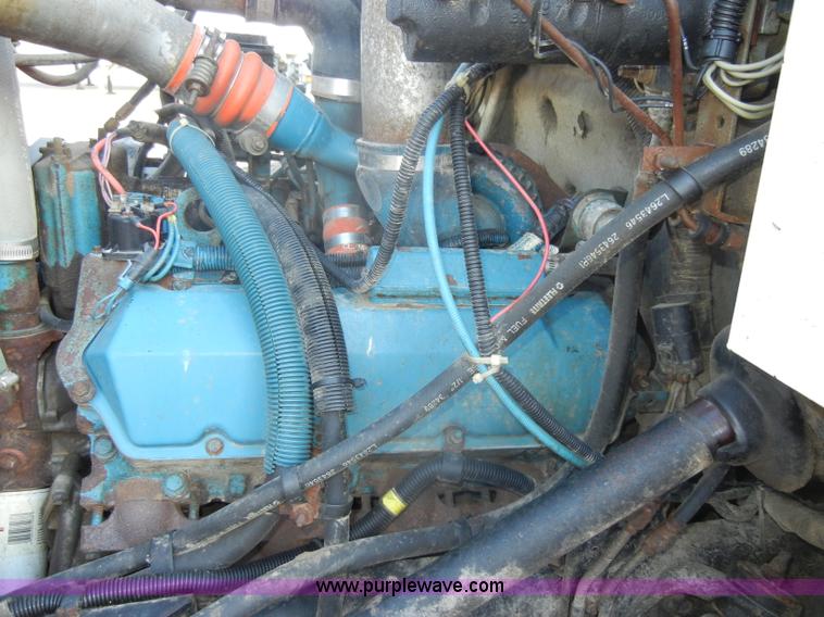 image for item C4366 1997 International 4700 flatbed truck