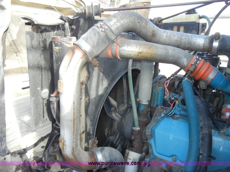 image for item C4366 1997 International 4700 flatbed truck