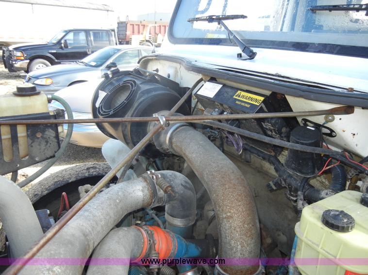 image for item C4366 1997 International 4700 flatbed truck