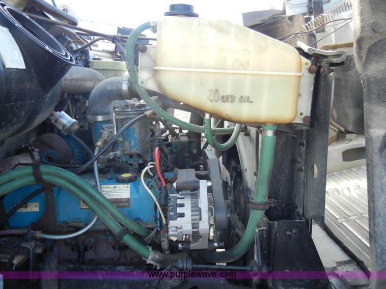 image for item C4366 1997 International 4700 flatbed truck