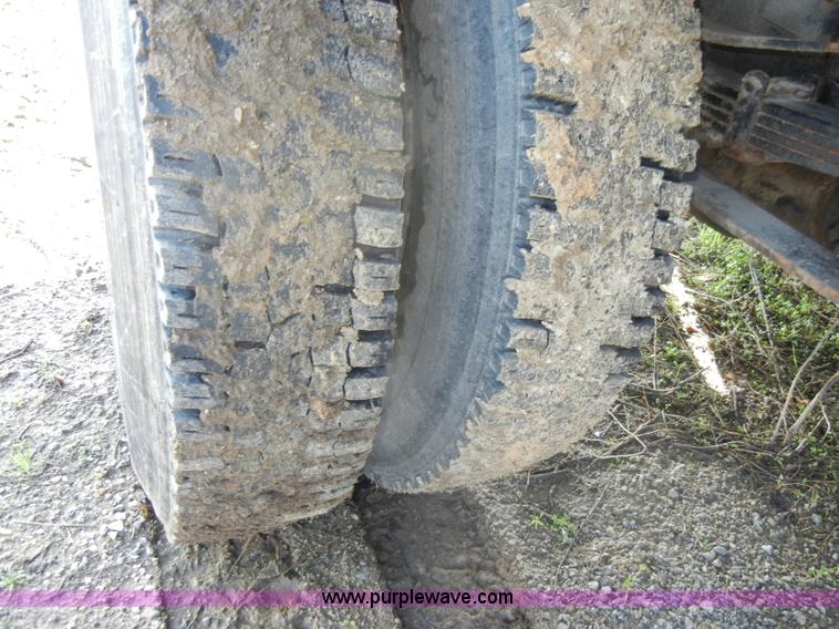 image for item C4366 1997 International 4700 flatbed truck