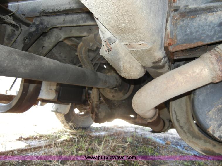 image for item C4366 1997 International 4700 flatbed truck