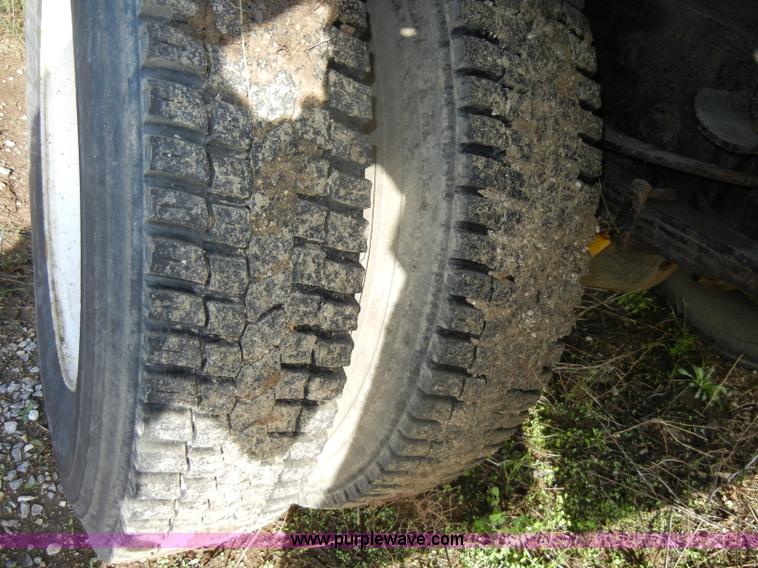 image for item C4366 1997 International 4700 flatbed truck