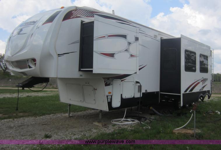 image for item C5426 2011 Keystone Fuzion toy hauler travel trailer