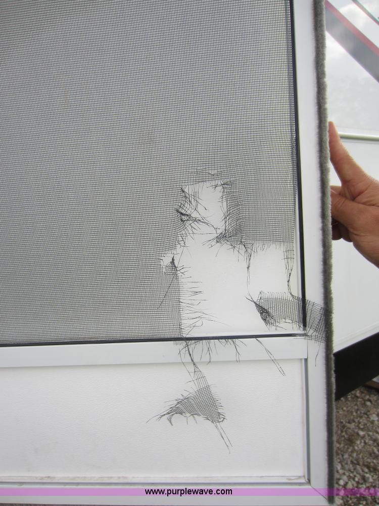 image for item C5426 2011 Keystone Fuzion toy hauler travel trailer