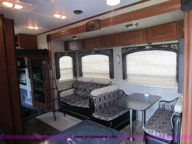 image for item C5426 2011 Keystone Fuzion toy hauler travel trailer