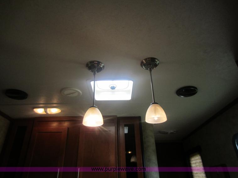 image for item C5426 2011 Keystone Fuzion toy hauler travel trailer