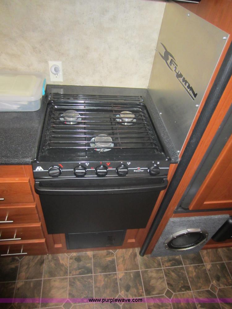 image for item C5426 2011 Keystone Fuzion toy hauler travel trailer